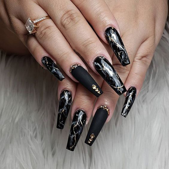 black marble nail design with diamonds