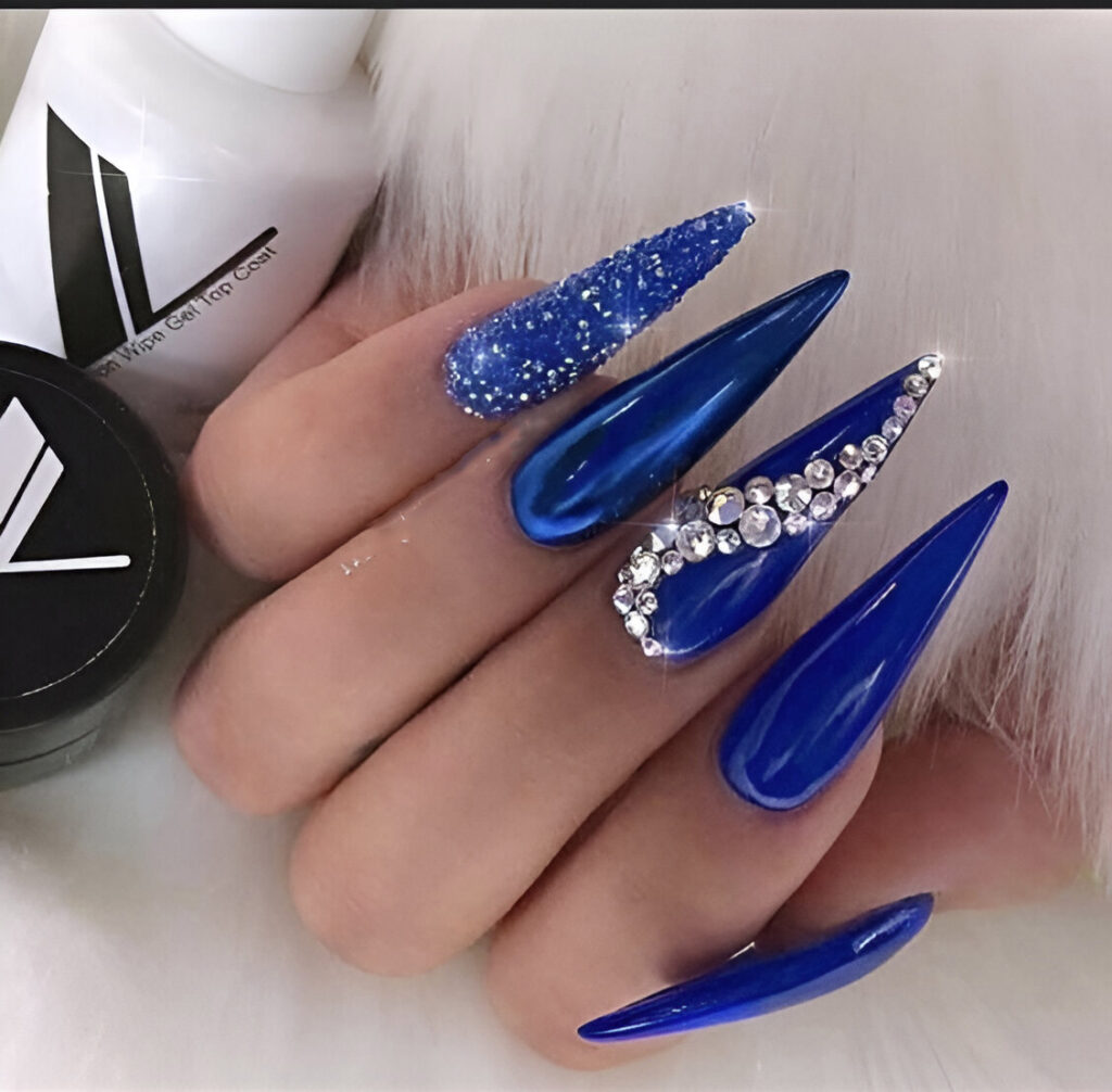 sapphire blue nail design with diamonds