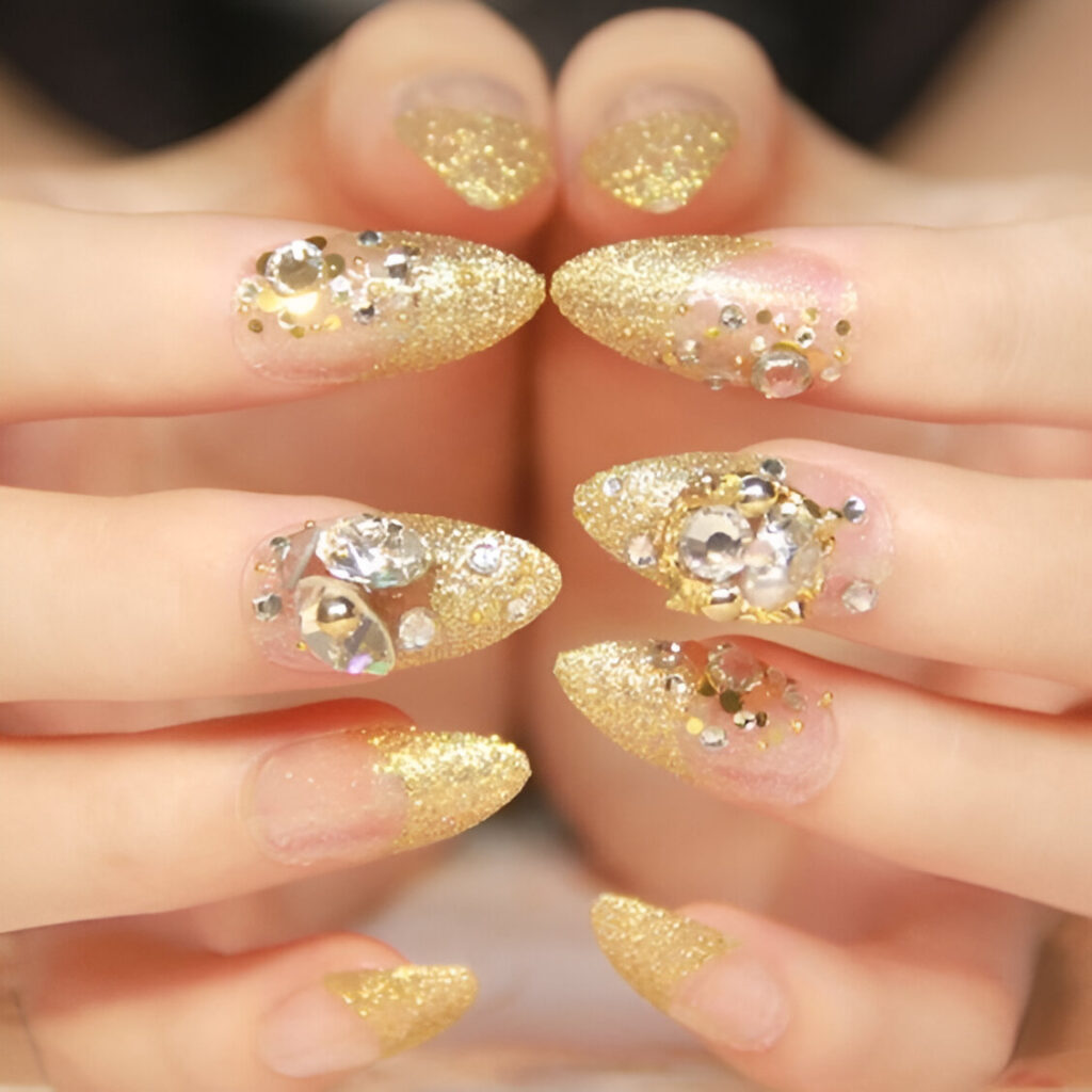 gold nail design with diamonds